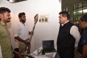 Amithab Kant CEO of Niti Aayog inspecting the Pepper Plucker and Sorter TechTop 2017 winning entry by Amal Jyothi